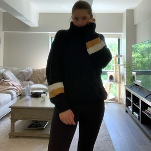 Black turtleneck sweater w/ sleeve detail